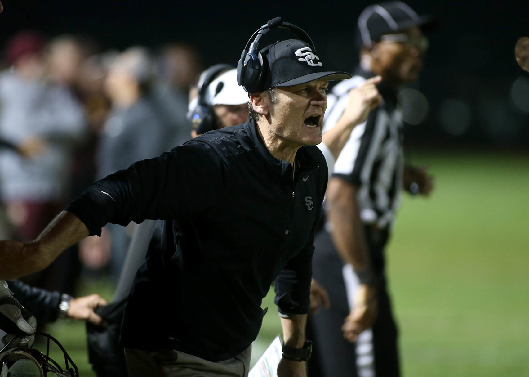 Sapolinte HS football coach Dennis Bene